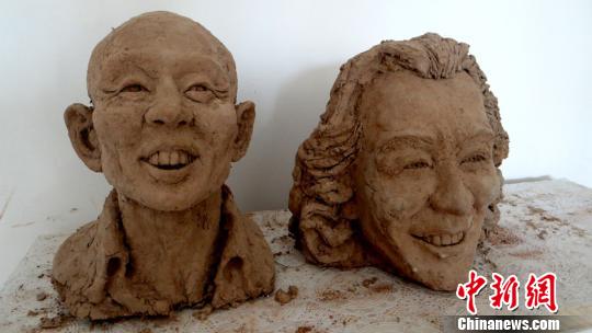 图为人物肖像泥塑。 郭惠民 摄